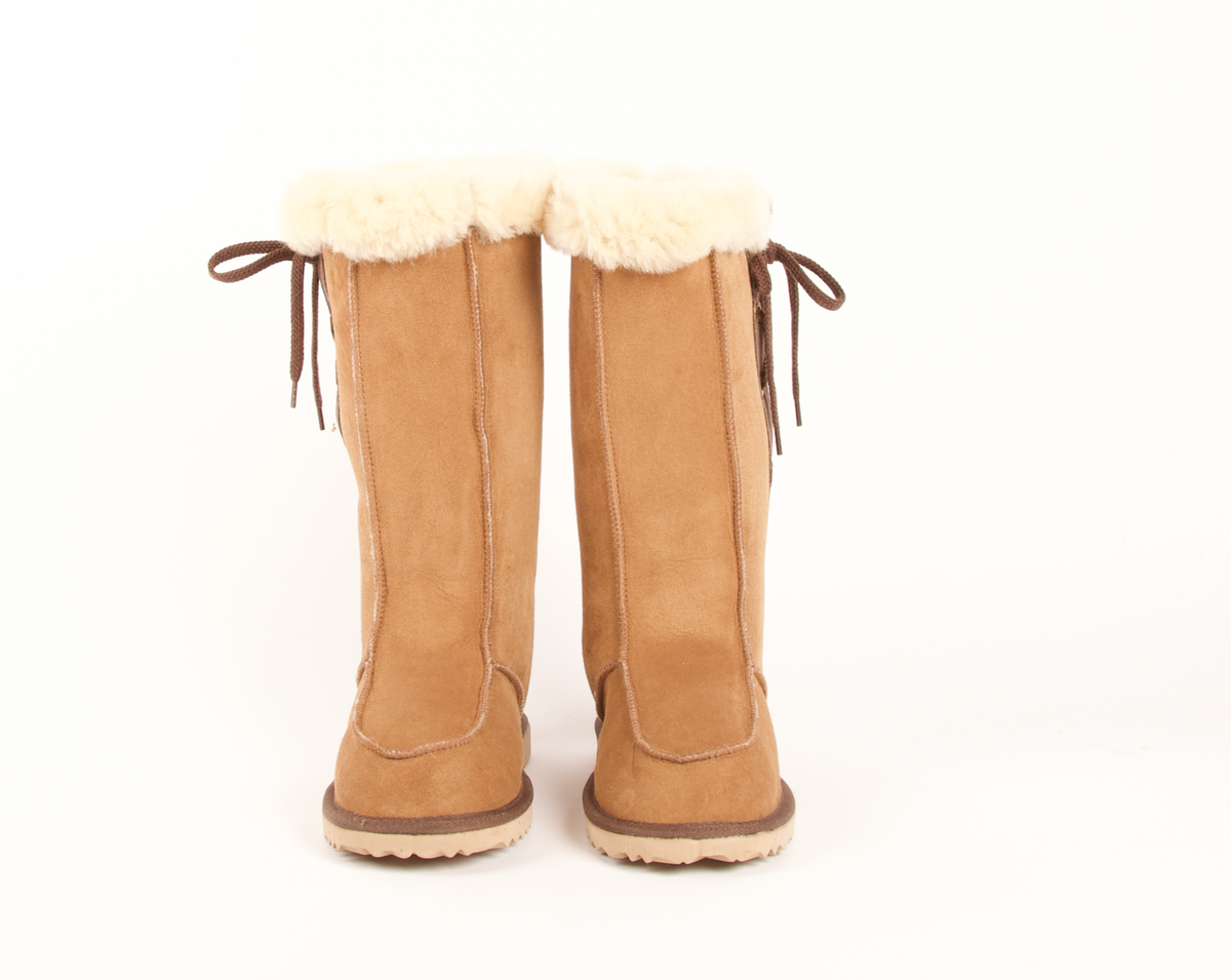 Aussie Uggs Lace-Up Jillaroo Boot. Lace-up moccasin style boot with fleece cuff. Genuine double face sheepskin. Durable hard rubber/EVA sole. Handmade in Australia
